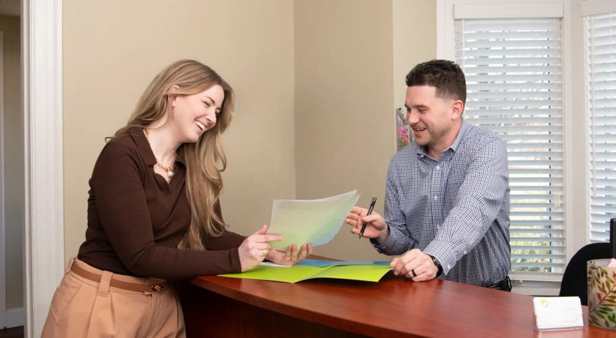 Advisor explaining a health insurance option to a client